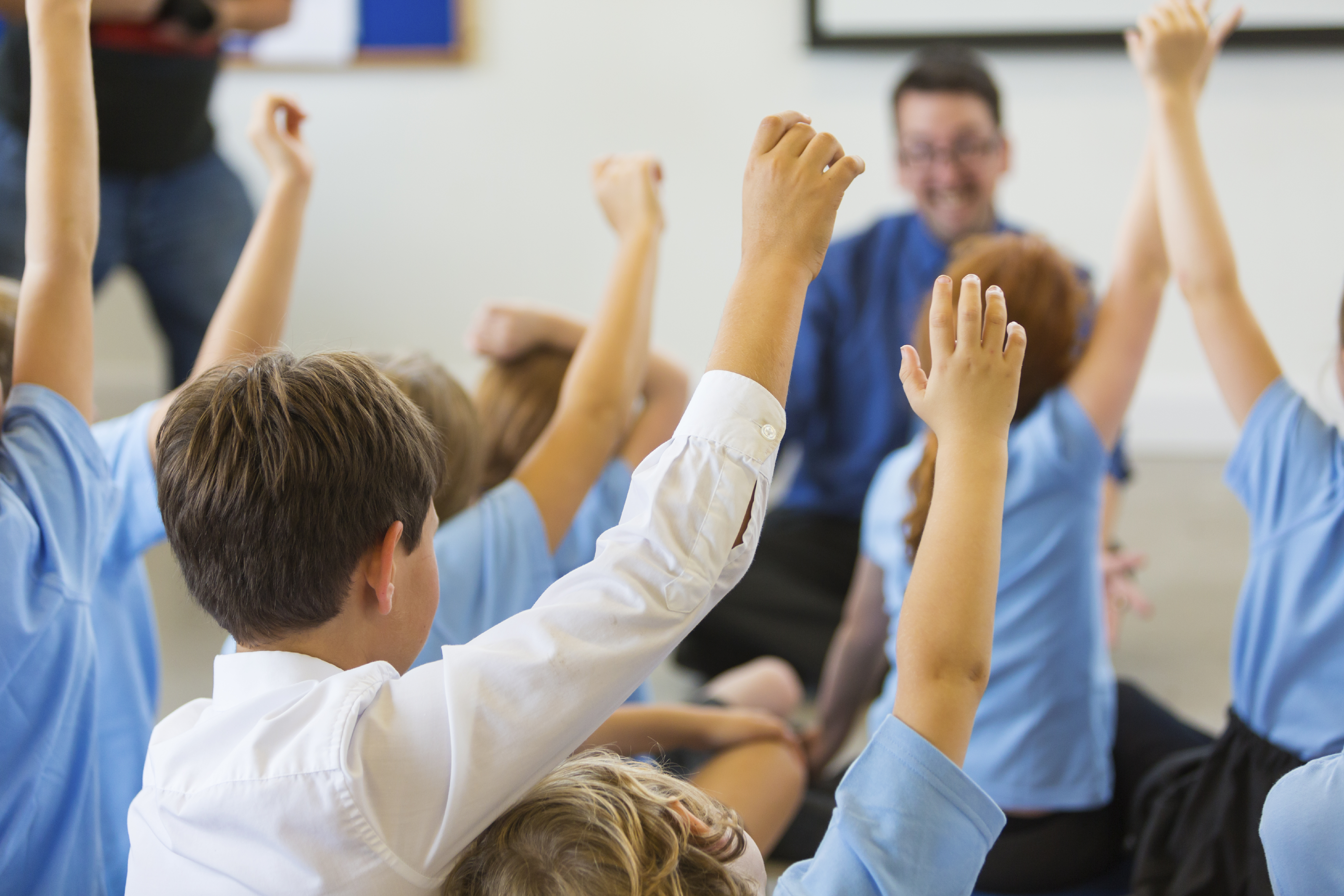 classroom hands up iStock_000059501890